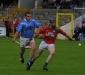Hold on there a second............Kevin Cleere (Graigue Ballycallan) gives Eoin McGrath (St. Martins) a helping hand during their St. Canices Credit Union SHC clash in Nowlan Park